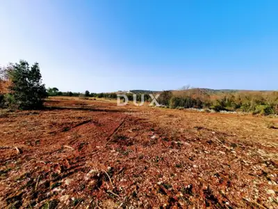 Land, Rovinj - next to the bicycle path and stone wall - 2