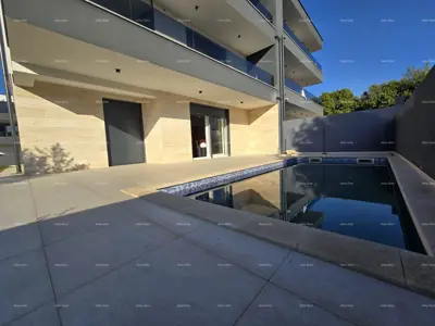 Verkauf einer Wohnung in einem Neubau mit Pool und zwei Parkplätzen, Medulin!