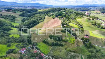 Building plot 5,642 m², Luka - panoramic views and privacy - 13