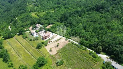 Building land, Pićan - permit and house project with a pool