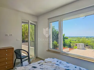 Kuća 140 m², Umag - grijani bazen i pogled na more - 10