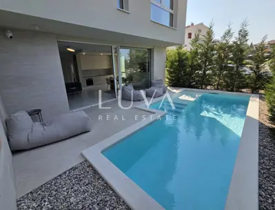 Trogir, Seget Vranjica, house 200 m² with pool by the sea