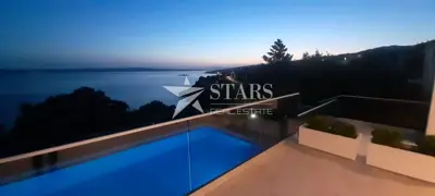 Novi Vinodolski, modern villa first row to the sea