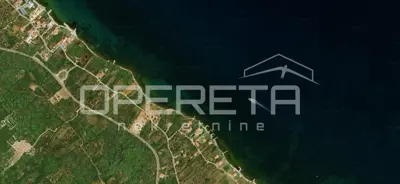 Građevinsko zemljište 1.157 m², Neviđane - prvi red uz more - 2