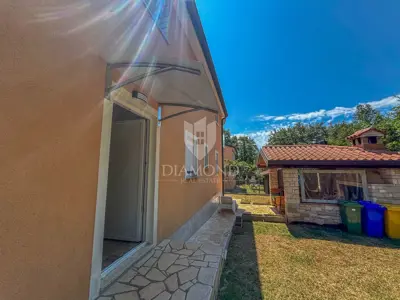 Kuća 164 m², Umag - velika okućnica i vrtna kuhinja - 19