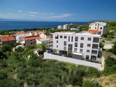 Tučepi - villa in a new development with 4 apartments