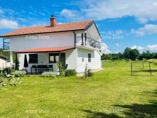 Complex: house + building plots + olive grove