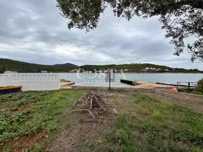 Građevinsko zemljište 1.037 m², Sutomišćica - 1. red do mora - 4