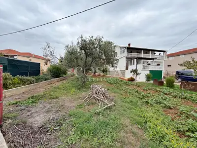 Građevinsko zemljište 1.037 m², Sutomišćica - 1. red do mora - 2