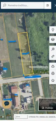 Baugrundstück, Jakovlje, an der Hauptstraße und mit Versorgungsanschlüssen