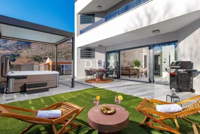 Krk, Draga Bašćanska, dvosobni stan 62 m², vrt, jacuzzi, najam