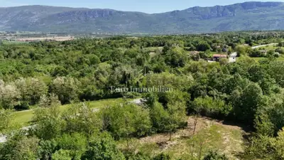 Građevinsko zemljište 1.899 m², Kršan - pogled na Učku