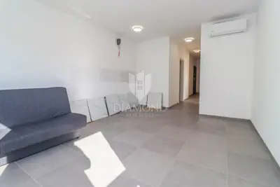 Stan 54 m², Medulin centar - 2 spavaće sobe, balkon - 5