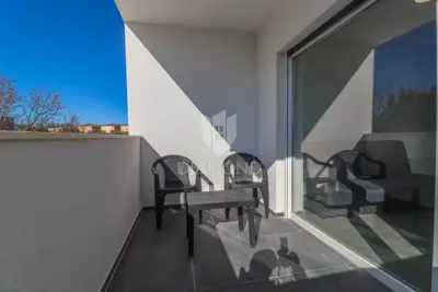 Stan 54 m², Medulin centar - 2 spavaće sobe, balkon - 10