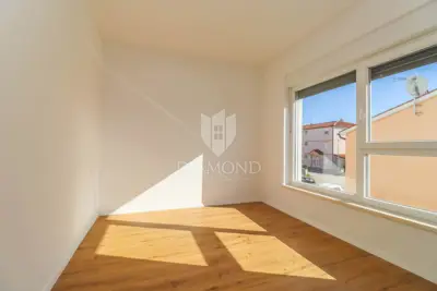 Stan 54 m², Medulin centar - 2 spavaće sobe, balkon - 2