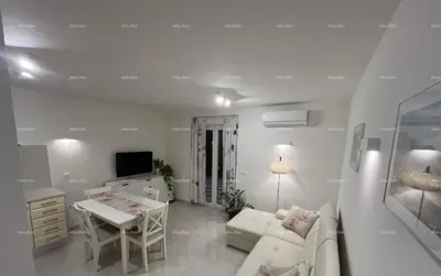 Apartment 64 m², Fažana - quiet part of Peroj, terrace with sea view