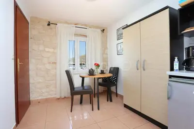 Trogir, Čiovo, kamena kuća s 3 apartmana, prodaja - 11
