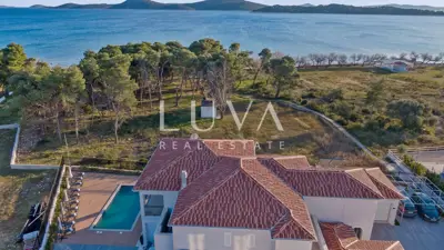 Vodice, luxury and unique villa with pool by the sea for sale