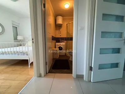 Apartman u Novalji, loggia s pogledom na more i parking - 13