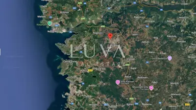 Građevinsko zemljište 1.011 m², Valentići - pogled na more - 2