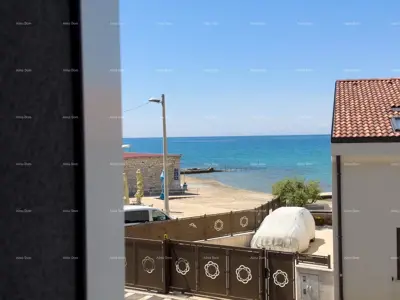 Prodaja stanova u stambeno-poslovnoj zgradi sa pogledom na more, centar Umaga! S3 - 16