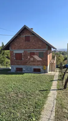 Perjavica - building plot 1,477 m² with house - 5