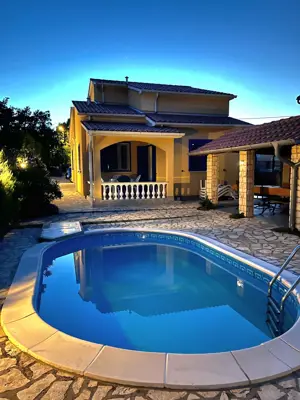 House with a pool surrounded by greenery, Labin, Istria