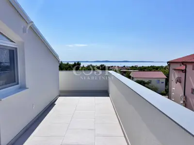 Stan 50 m², Vir - novogradnja s terasom i parkirnim mjestom