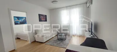 Apartment 50 m², Savica, new build with garage parking space - 1